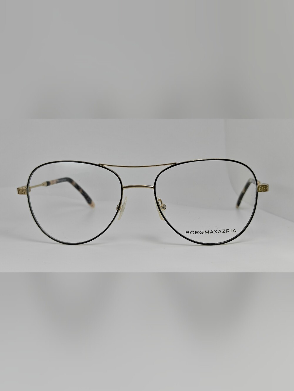 BCBGMAXAZRIA Call Aviator Eyeglass Frames in Black and Gold. Feminine.